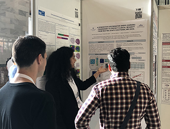 Shimona D'Souza presents her poster at the 2018 MICCAI conference.