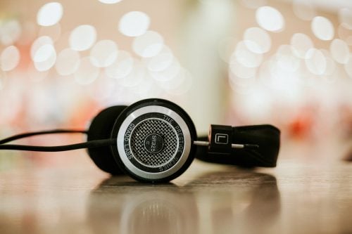 A pair of headphones on a flat surface.