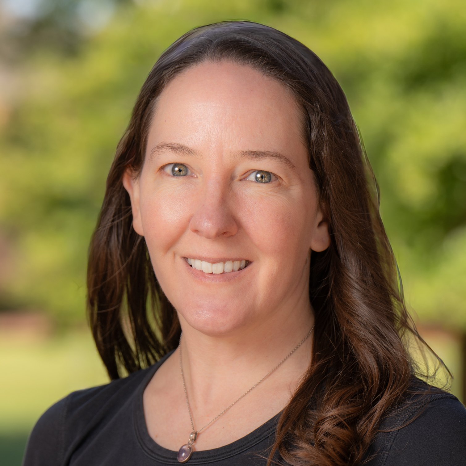 Headshot of Alexis Battle.