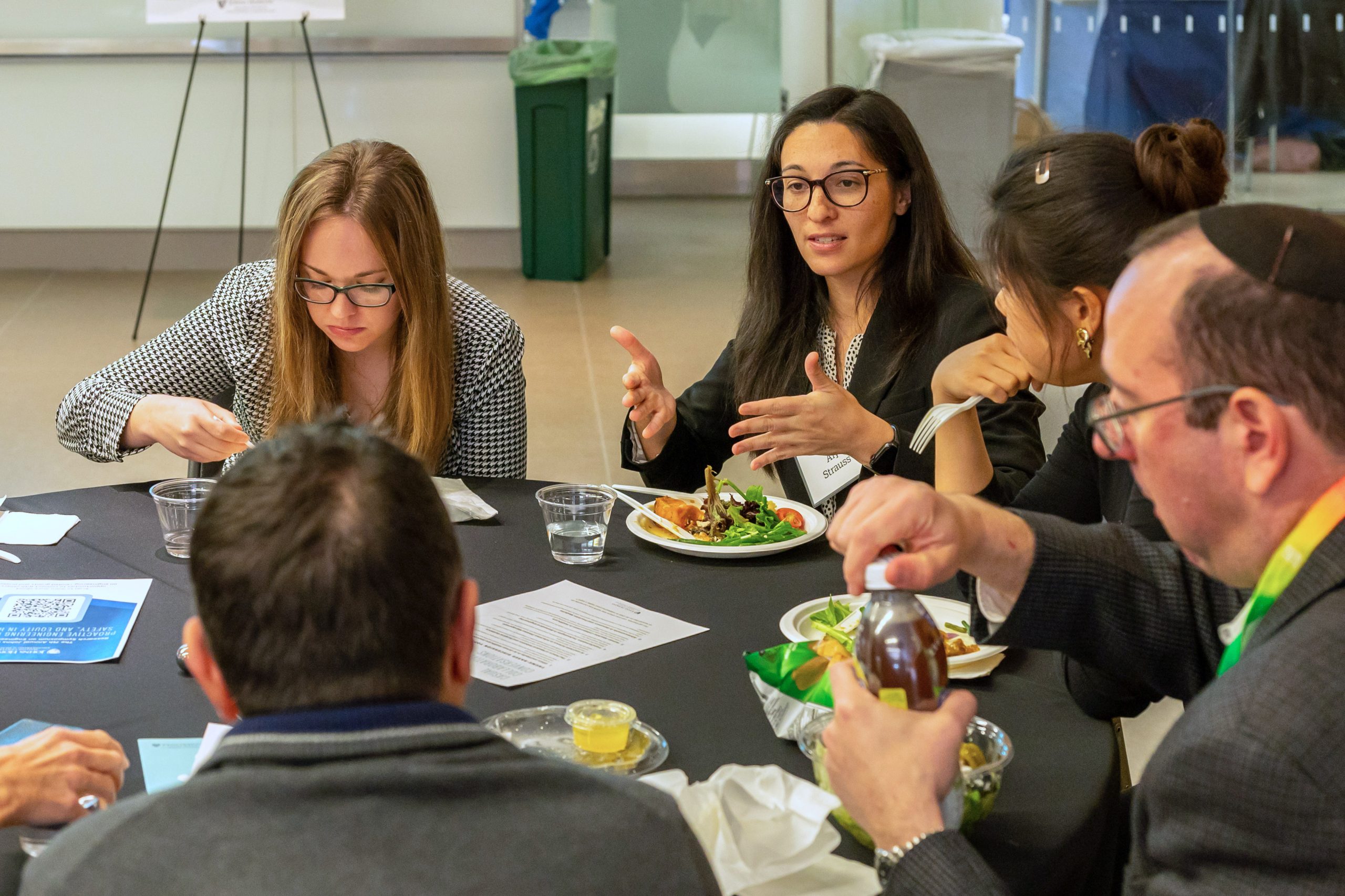 Led by Aly Strauss, researchers discuss at lunch at the 2023 Johns Hopkins Research Symposium on Engineering in Healthcare.