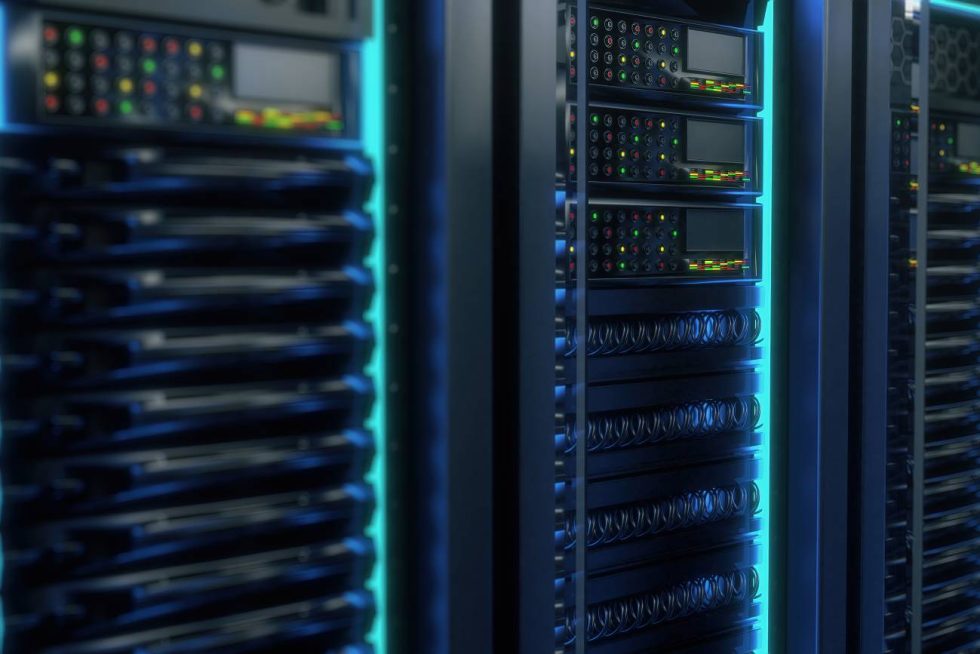A close-up shot of servers in a server rack with lighted LEDs.