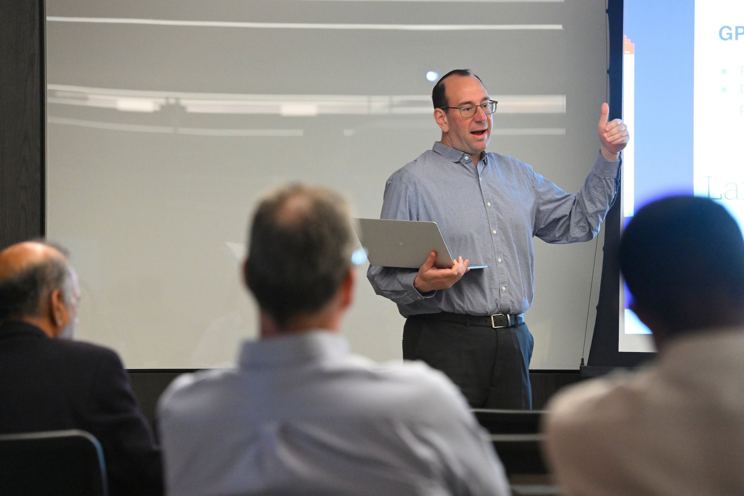 Mark Dredze presents AI and Language at the congressional information session.