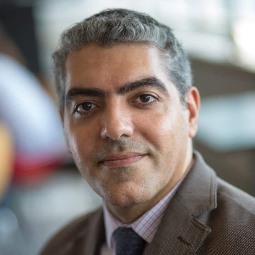 Headshot of Ahmed Hassoon.