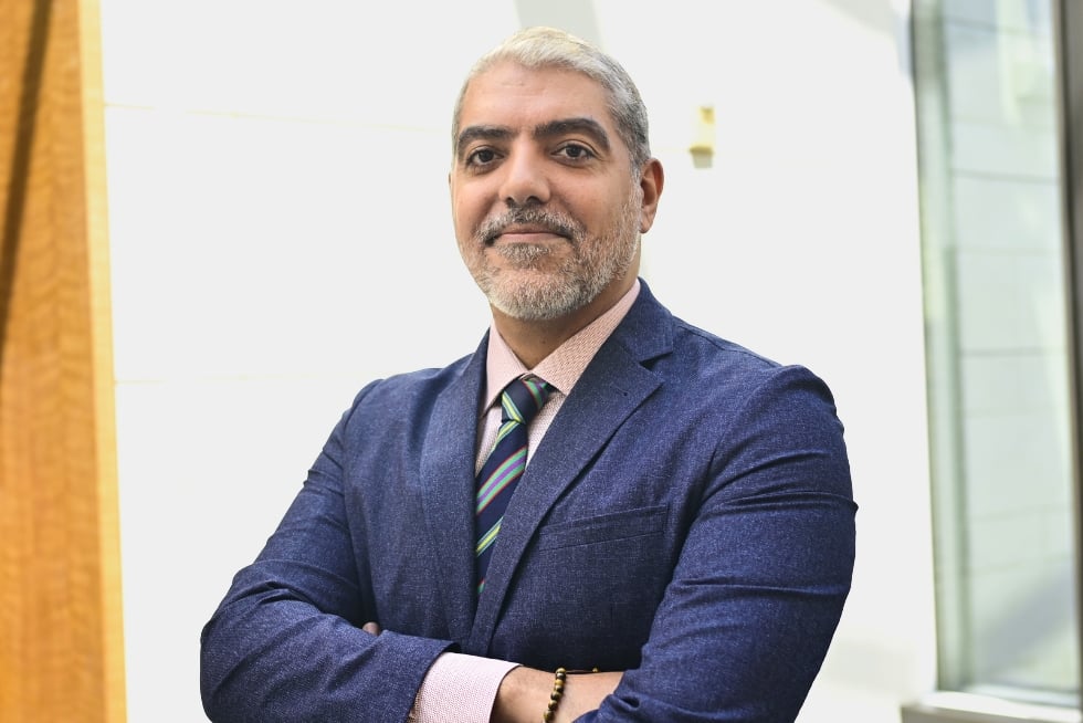 Headshot of Ahmed Hassoon.